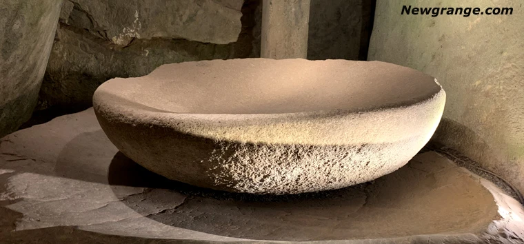 Basin stone in the east recess of the Newgrange chamber, carved from Mourne granite
