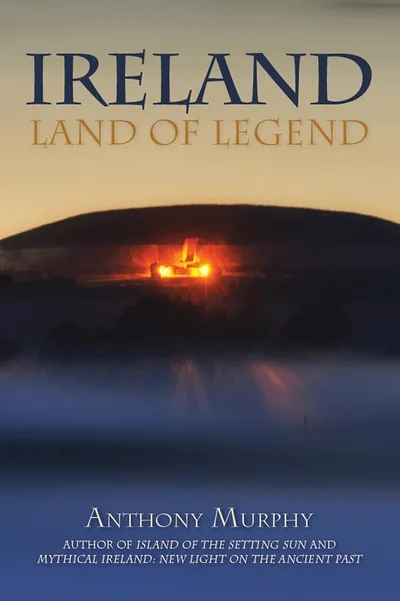 Book cover: Ireland: Land of Legend by Anthony Murphy, a passage tomb glowing at dawn above mist.