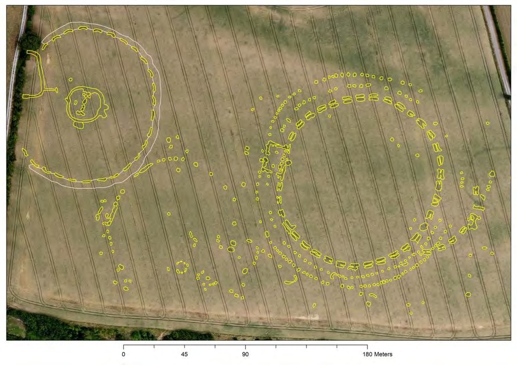 Aerial photograph of a wheat field with the Geometric
         Henge traced in yellow and a neighbouring henge traced
         in white.