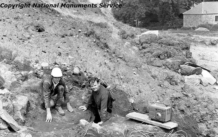 George Eogan at the opening to the passage of the Eastern tomb at Knowth in August 1969