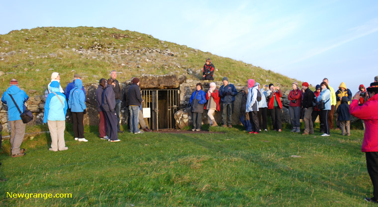 The rising sun shining directly into Cairn T 